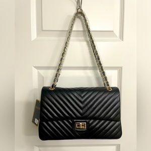 Brand new boutique black and gold purse!